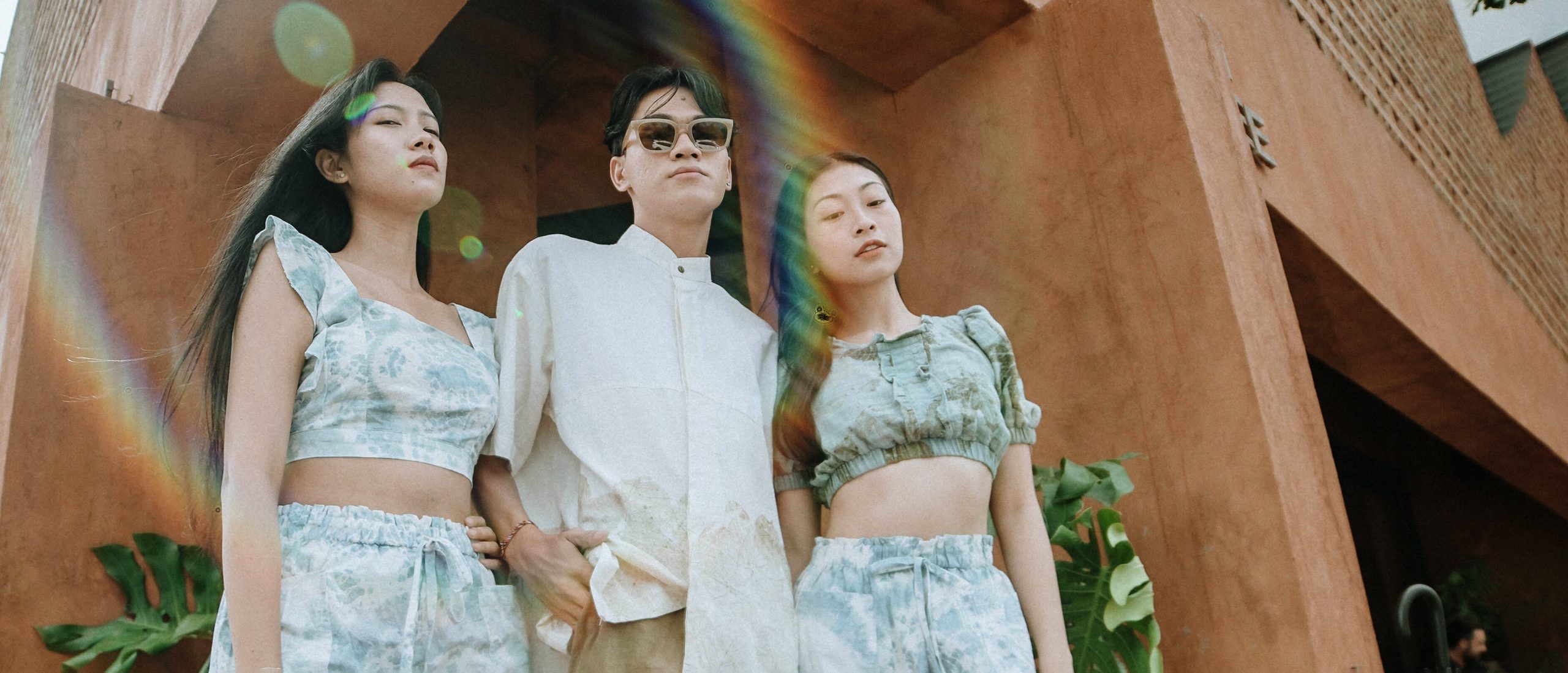 Two people standing in front of a building